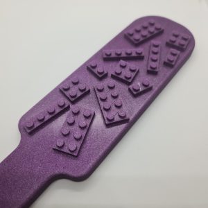 The Brickpain Paddle - BDSM Paddle mit Klemmbausteinen - SM Impact Play Paddle